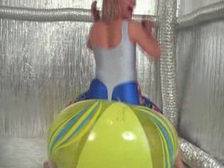 girl deflates beachball 4